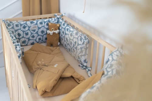 Ochraniacz do łóżeczka 70x140 cm w niebieskie lwy